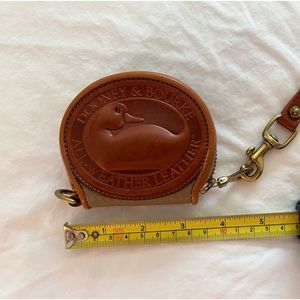 Dooney Bourke big duck pebbled leather coin purse.